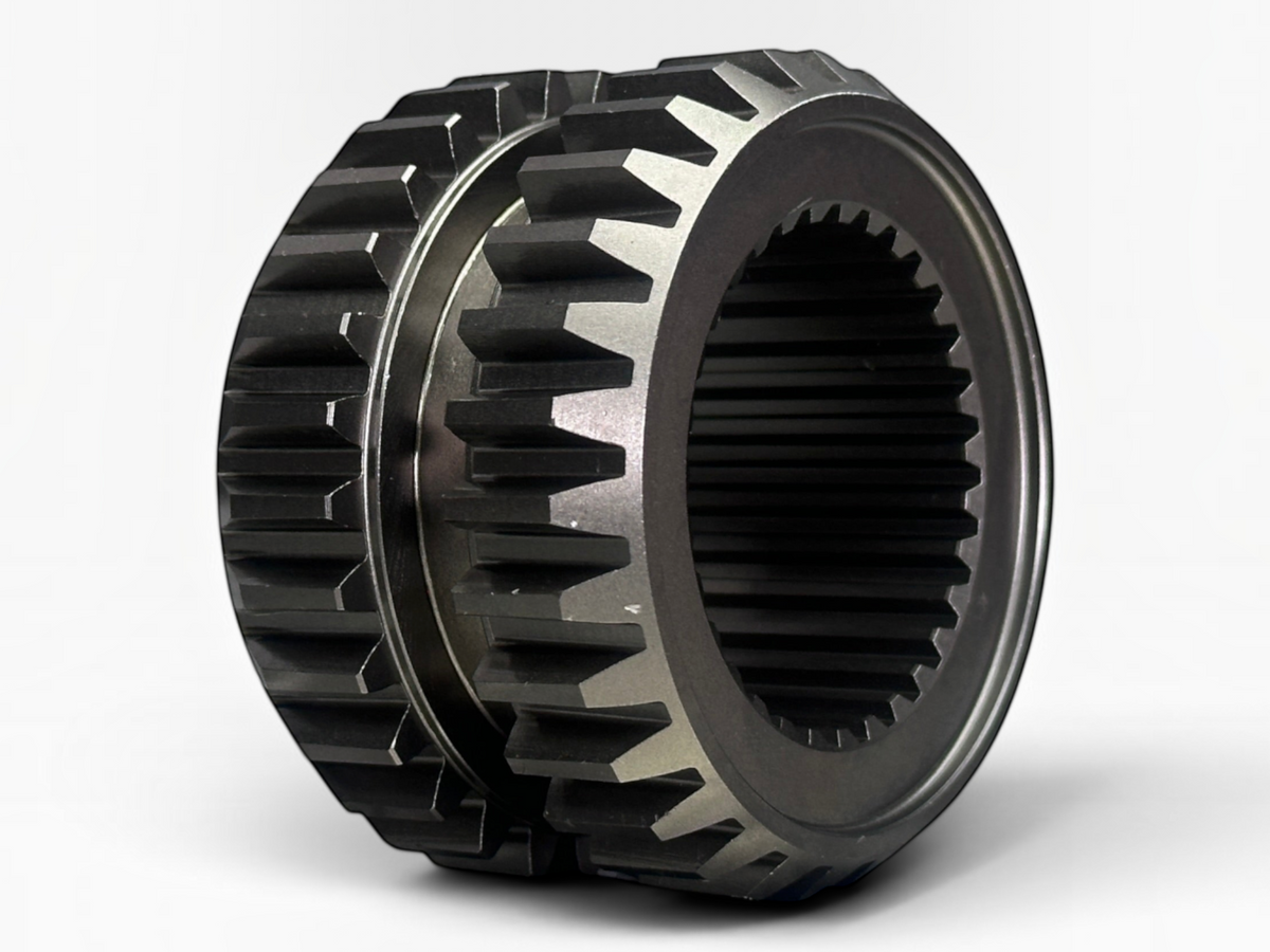 J x Trucks 320KB3148 sliding clutch gear with internal splines and dual gear rings on a diamond plate surface